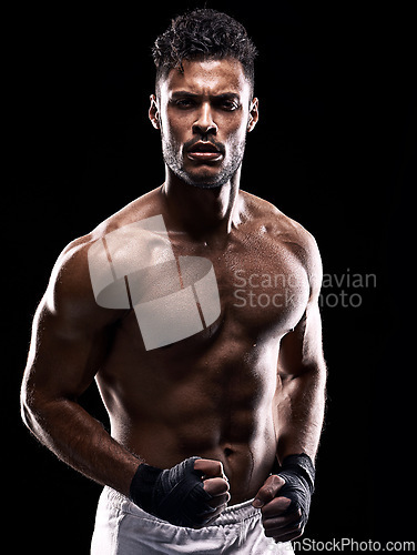 Image of Fitness, strong and portrait of man with boxing for sport, exercise and workout isolated in black background. Male person, athlete and boxer in studio backdrop for wellness, training and health