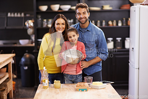 Image of Parents, kid and portrait for baking with love, ingredients for cake or dessert with support and handmade with care. Mom, dad and girl child together in kitchen for bonding or teaching with affection