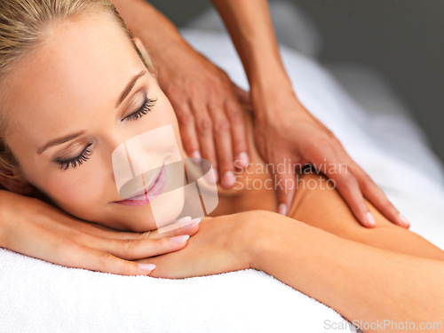 Image of Calm, hands and woman with back massage at spa for wellness, health and self care. Relax, zen and happy female person sleeping with masseuse for body skin treatment or therapy at beauty salon.