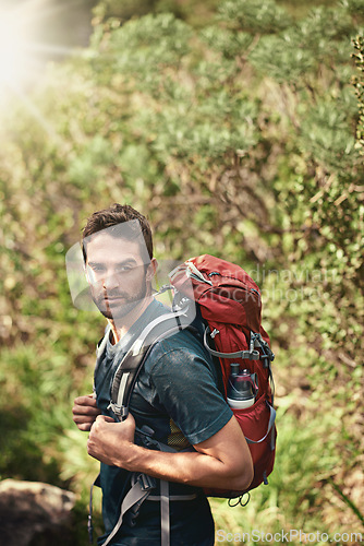 Image of Man, hiking and nature for adventure, health and wellness with view and mountain. Athlete, exercise and fitness with summer, sunshine and backpack journey on cape town trail with travel and vacation