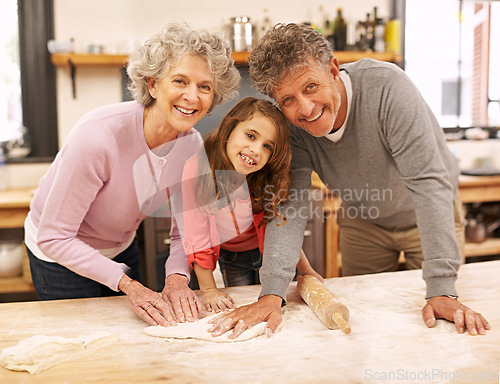 Image of Cooking, smile or portrait of grandparents with child in kitchen teaching for support or learning in home. Family, baking or girl with dough, grandma or elderly grandfather for dinner, pizza or lunch