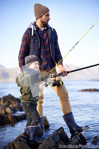 Image of River, father and son with rod for fishing, water and nature for bonding of dad with boy together. Parent, male person and man with kid for adventure in countryside, happiness and smile of child