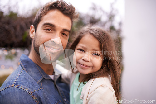 Image of Portrait, love and father carry girl for bonding, outside and fun with care . Family, parent and young daughter or kid with smile in nature, embrace and happiness for vacation or travel with dad