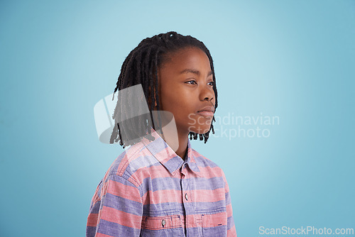 Image of Children, thinking and black boy in studio why questions, memory or reflection on blue background. Brainstorming, remember and African teen model with vision for solution, problem solving or guess