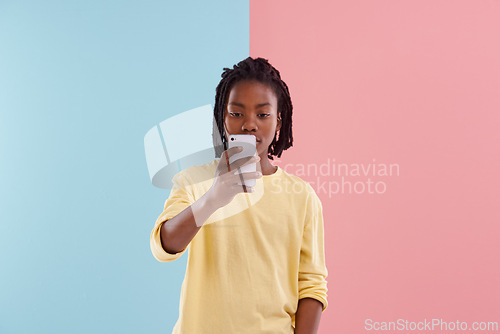 Image of Teen, boy and selfie of student in studio, background with color and lgbt youth with pride in high school. Trans, kid and post on social media about queer identity and confident in profile picture