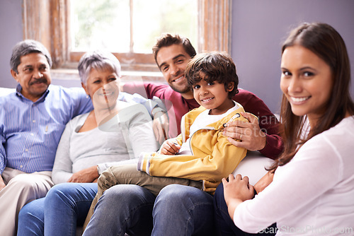 Image of Portrait of happy grandparents, parents and child on sofa for bonding, relationship and relax together. Big family, home and mother, father and kid with seniors for holiday, vacation and weekend