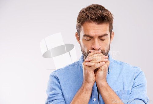 Image of Man, praying and worship with hope and faith in God, seek help and advice for guidance on white background. Spiritual, religion and gratitude with thanks, prayer and forgiveness with belief in studio