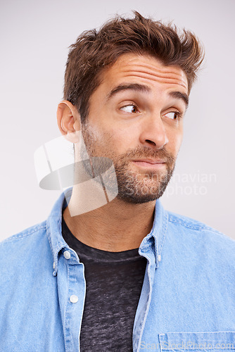 Image of Thinking, confused and man with ideas, choice and emotion on white studio background with solution and emoji. Person, model and guy with decision and question with why, reaction and unsure doubt