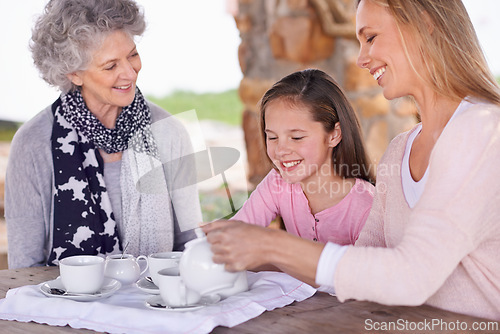 Image of Woman, child and relax with tea for fun, generations in park together for bonding with love. Family time, mother and happy grandma and smile for summer garden picnic, cups and teapot for beverage