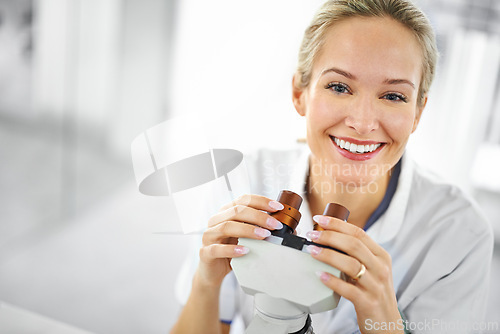 Image of Happy woman, portrait and scientist with microscope for biology, chemistry or forensics at lab. Face of female person or medical expert with smile for test, exam or scientific research at laboratory