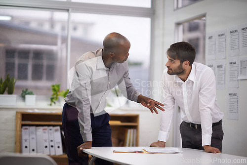 Image of Businessman, teamwork or discussion with document in office for financial planning, project strategy or meeting. Professional, employees or collaboration with paperwork for brainstorming or diversity