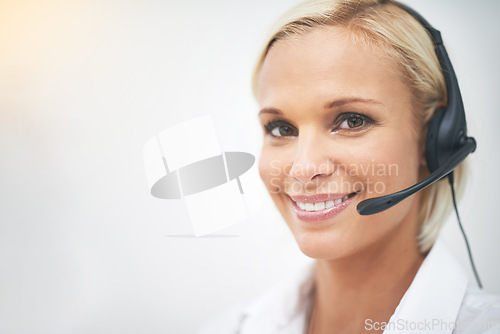 Image of Woman, happy and portrait in call center with mockup space for networking, telemarketing or crm job. Person, smile and headphone with mic for voip communication, customer service and tech support