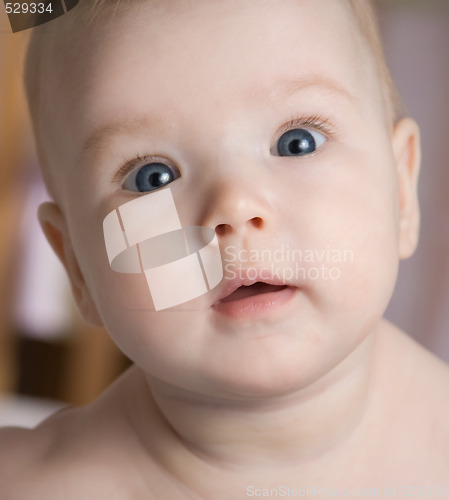 Image of baby in a bed 