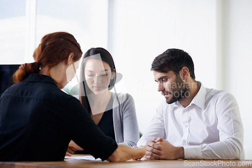 Image of Business people, paperwork and discussion in office, planning and documents for strategy. Colleagues, workplace and communication in law firm for problem solving, solution and lawyers for research