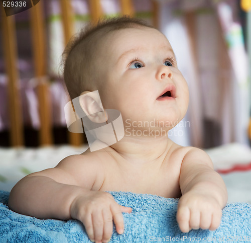 Image of baby in a bed