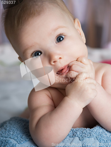 Image of baby in a bed 