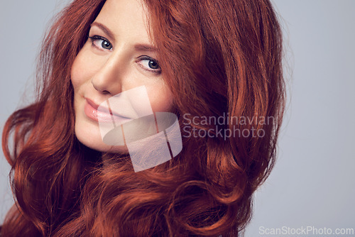 Image of Ginger, beauty and portrait of woman with hair care in studio, background and mockup. Cosmetics, makeup and red dye for natural shine and color on hairstyle or healthy skincare from dermatology