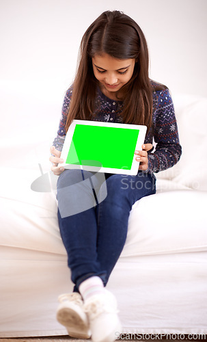 Image of Home, green screen or child with tablet for mockup, playing games or streaming videos on movie website. Space, online or female kid with ebook or technology to download on social media app on sofa