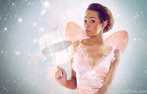 Image of Woman, fairy and magic with glitter in studio portrait for wand, shine and pride with stars on background. Person, model or girl for fantasy, costume and butterfly wings for story, art and creativity