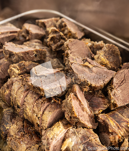 Image of Juicy pieces of slow-cooked beef brisket