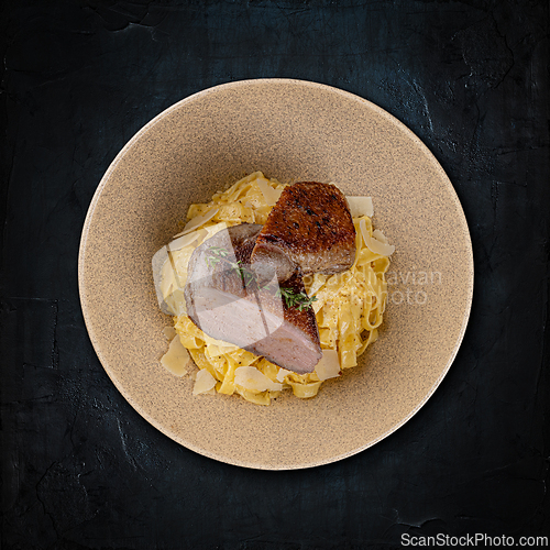 Image of Gourmet pork belly with pasta