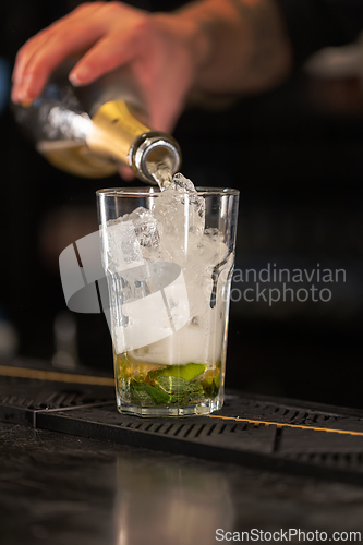 Image of Bartender preparing a classic mojito