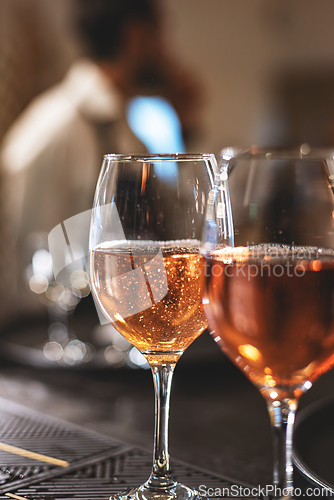 Image of Close-up of two glasses of rose sparkling wine