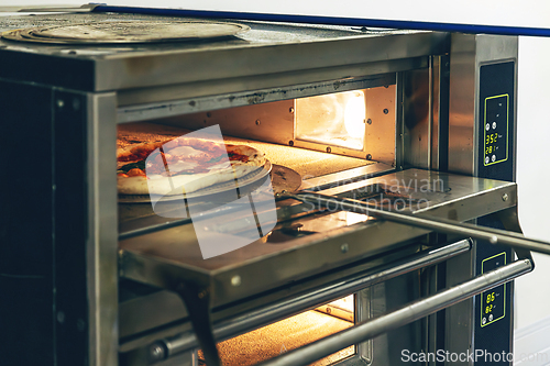 Image of Fresh pizza baked in oven