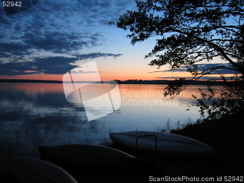 Image of Canoes at sunset