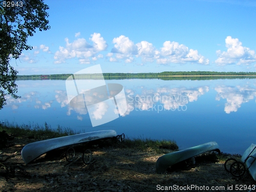 Image of Canoes by lake