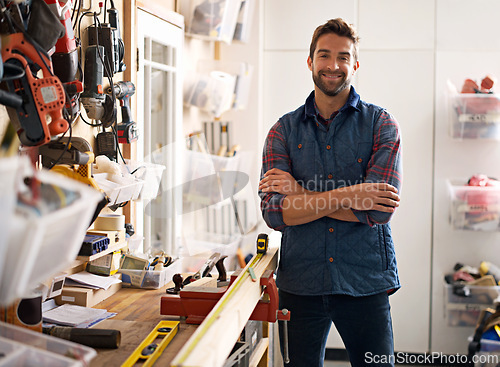 Image of Tools, contractor and portrait of man in workshop for manufacturing, production and creative small business. Male person, equipment and handyman with confidence for renovation, maintenance or project