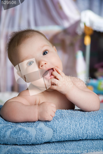 Image of baby in a bed