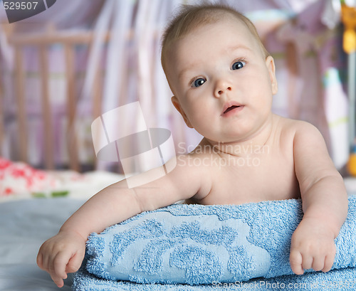 Image of baby in a bed