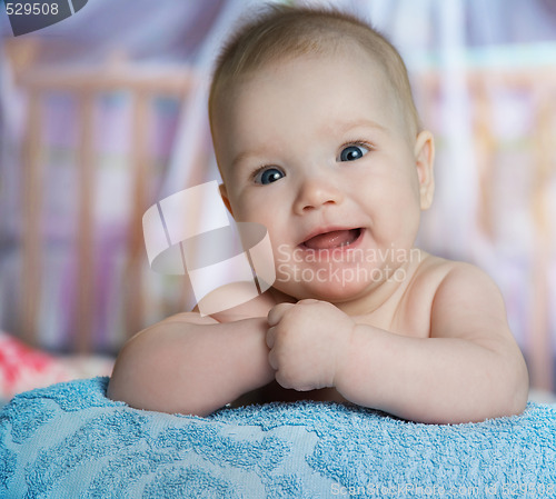 Image of baby in a bed