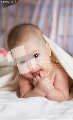 Image of baby in a bed