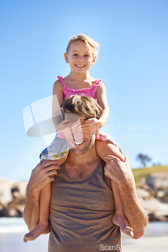 Image of Portrait, dad and shoulder to carry girl for family, game and bonding together on summer beach day. Blue sky, papa and young daughter for fun walk, happiness and sunshine on vacation in Spain