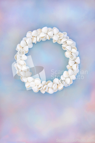 Image of Cockleshell Seashell Wreath on Rainbow Sky Background