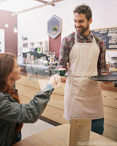 Image of Woman, cafe and waiter with drink at table, smile and service for catering in morning with kindness. People, girl and barista for giving tea cup, latte and happy for breakfast in coffee shop in Italy