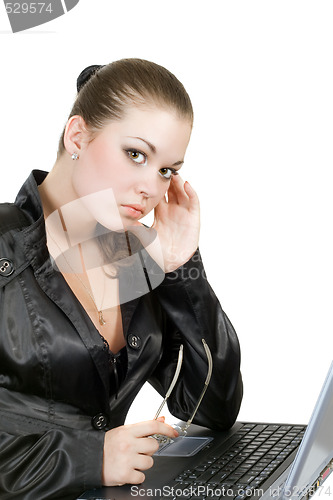 Image of Young businesswoman with laptop. Isolated on a white