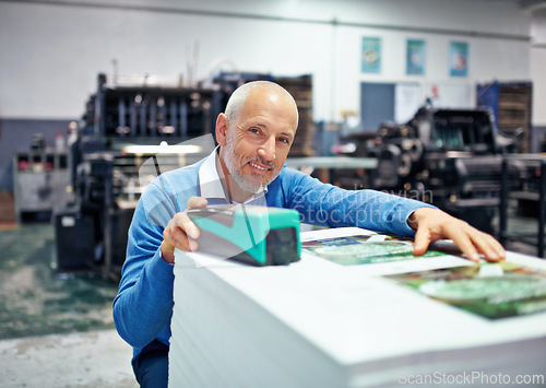 Image of Printing, factory and portrait of man with paper for quality control, design or product inspection. Warehouse, printer workshop and person for logistics, manufacturing and industrial production