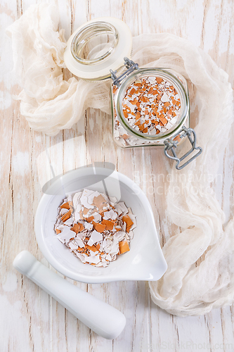 Image of Preparing  crushed eggshells for  vegetable bed, eggshells stored for making natural fertilizers for growing vegetables