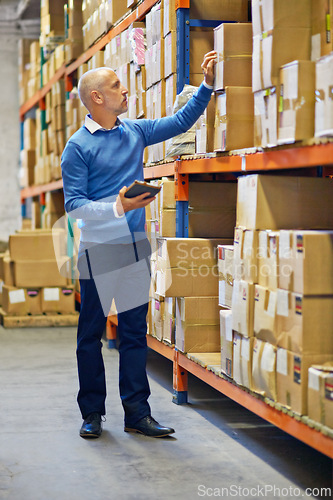 Image of Boxes, tablet or man in factory for stock or logistics info for a delivery order by shelf in warehouse. Check, inventory or mature manager with product, package or cargo shipping for distribution