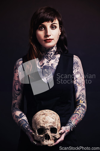 Image of Skull, tattoo or portrait of woman in studio for fashion isolated on black background for edgy style. Bones, hope or cool female punk model with ink for unique art, aesthetic or creative expression