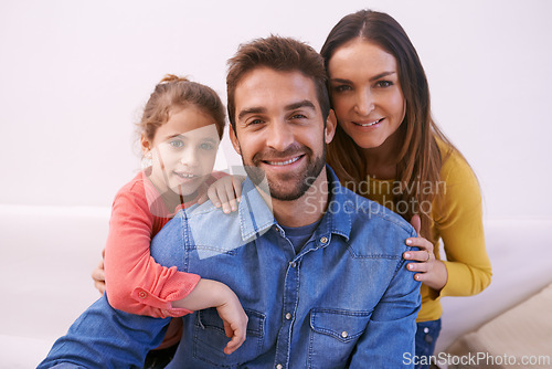 Image of Family, portrait and home with girl, smile and bonding together with happiness and relaxing with weekend break. Parents, mother and father with daughter and fun childhood with cheerful kid and love