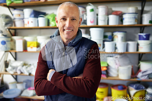 Image of Portrait, man and confidence of happy store owner in business or retail for plastic in startup. Face, arms crossed and mature professional in shop, entrepreneur and smile of manager in Switzerland