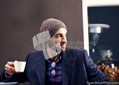 Image of Thinking, cafe and serious man drinking coffee for breakfast at cafeteria or restaurant in the morning. Dream, tea cup and person with espresso, latte or planning future at shop with winter fashion