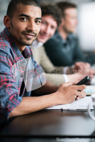 Image of Businessman, smartphone and portrait in office with coworkers, business meeting and collaboration in startup project. Creative, professional man and colleagues for corporate presentation in workplace