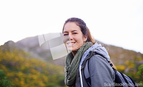 Image of Outdoor, foliage and portrait of girl with smile for hiking with joy and backpack for journey in bush. Adult, female person and woman with happiness for travel for winter holiday in Cape Town