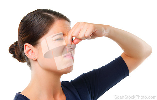 Image of Smelly, yuck and woman with disgust facial expression for gross, fart and odor on white background and alone. Young person or model and isolated with finger on nose for stink or scent on mockup