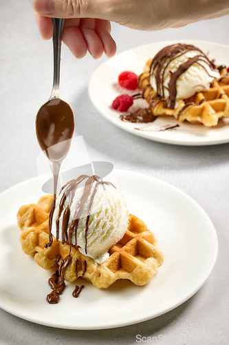 Image of plate of belgian waffle with ice cream